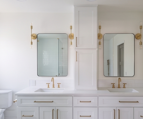 Double vanity with gold fixtures