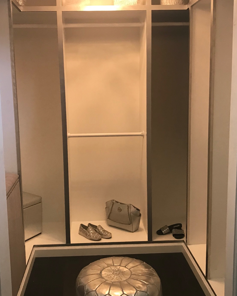 Completed walk-in closet with built-in shelving